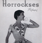 Vintage advertisement for Horrockses Fashions featuring a woman in a floral dress.