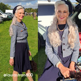A side-by-side collage shows a woman outdoors wearing a coordinated outfit: a light blue textured jacket, dark navy skirt, dark top, pearl necklace, and dark beret. The left panel shows her standing on a grassy field with cars and people in the background; the right panel is a closer seated view.
